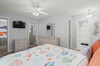 This spacious 3 Bedroom 2.5 Bath raised 1.5 story beach house is on Prestwick Country Club in South Carolina - for sale on GolfHomes.com, golf home, golf lot