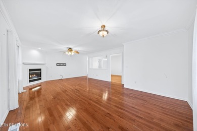 Wake up to shimmering water views and spend your evenings on Lake Tansi Village Country Club in Tennessee - for sale on GolfHomes.com, golf home, golf lot