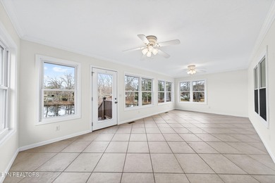 Wake up to shimmering water views and spend your evenings on Lake Tansi Village Country Club in Tennessee - for sale on GolfHomes.com, golf home, golf lot