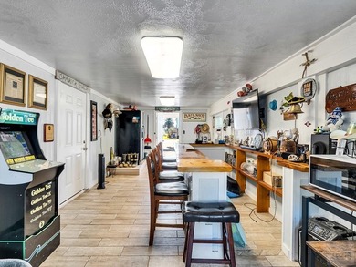 This home is a must-see in the heart of Jamaica Beachpletely on Galveston Country Club in Texas - for sale on GolfHomes.com, golf home, golf lot