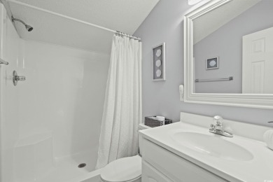This spacious 3 Bedroom 2.5 Bath raised 1.5 story beach house is on Prestwick Country Club in South Carolina - for sale on GolfHomes.com, golf home, golf lot