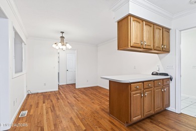 Wake up to shimmering water views and spend your evenings on Lake Tansi Village Country Club in Tennessee - for sale on GolfHomes.com, golf home, golf lot