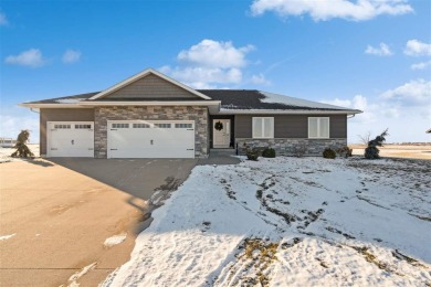 Welcome to your dream home! This stunning 4-bedroom, 3-bathroom on West Liberty Golf and Country Club in Iowa - for sale on GolfHomes.com, golf home, golf lot