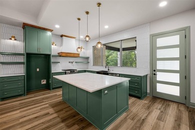 Modern design and timeless craftsmanship combine in this 2,344 on Pecan Plantation Country Club in Texas - for sale on GolfHomes.com, golf home, golf lot