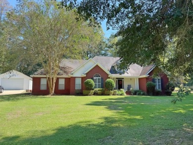 Welcome to your dream home in the serene Olympia Spa subdivision on Dothan National Golf Club and Hotel in Alabama - for sale on GolfHomes.com, golf home, golf lot