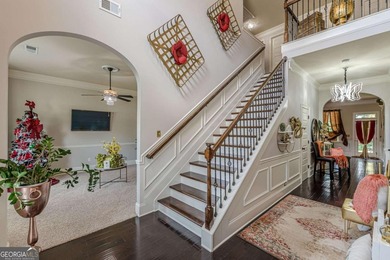 Discover this beautifully designed 4-sided brick home tucked on Crystal Lake Golf and Country Club in Georgia - for sale on GolfHomes.com, golf home, golf lot