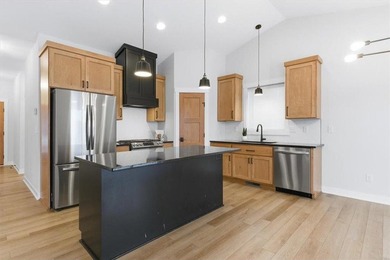 Nestled in the heart of the Hadley Hills neighborhood lies this on Hadley Creek Golf Course in Minnesota - for sale on GolfHomes.com, golf home, golf lot