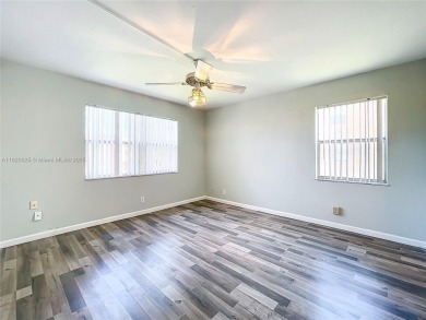 Spacious and updated 2BD/2BA corner unit in Sunrise Lakes (55+) on  in Florida - for sale on GolfHomes.com, golf home, golf lot