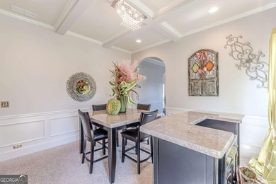 Discover this beautifully designed 4-sided brick home tucked on Crystal Lake Golf and Country Club in Georgia - for sale on GolfHomes.com, golf home, golf lot