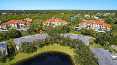 This lovely turnkey 2nd floor end unit coach home offers 2 on Pelican Sound Golf and River Club in Florida - for sale on GolfHomes.com, golf home, golf lot