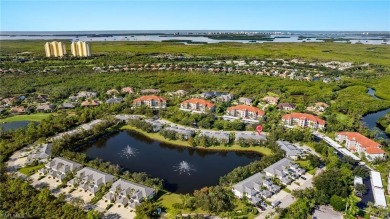 This lovely turnkey 2nd floor end unit coach home offers 2 on Pelican Sound Golf and River Club in Florida - for sale on GolfHomes.com, golf home, golf lot