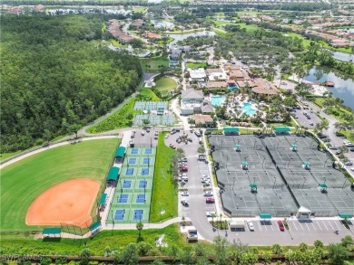 Discover this exquisite 2-bedroom, plus large den with closet on Pelican Preserve Golf Club in Florida - for sale on GolfHomes.com, golf home, golf lot