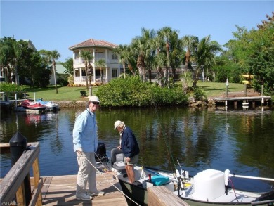 This lovely turnkey 2nd floor end unit coach home offers 2 on Pelican Sound Golf and River Club in Florida - for sale on GolfHomes.com, golf home, golf lot