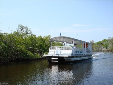 This lovely turnkey 2nd floor end unit coach home offers 2 on Pelican Sound Golf and River Club in Florida - for sale on GolfHomes.com, golf home, golf lot