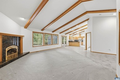 Peaceful Sunland golf course retreat with single-level living in on SunLand Golf and Country Club in Washington - for sale on GolfHomes.com, golf home, golf lot