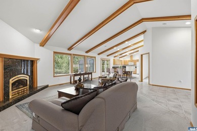 Peaceful Sunland golf course retreat with single-level living in on SunLand Golf and Country Club in Washington - for sale on GolfHomes.com, golf home, golf lot