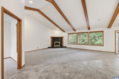 Peaceful Sunland golf course retreat with single-level living in on SunLand Golf and Country Club in Washington - for sale on GolfHomes.com, golf home, golf lot