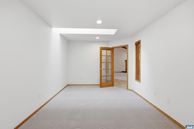 Peaceful Sunland golf course retreat with single-level living in on SunLand Golf and Country Club in Washington - for sale on GolfHomes.com, golf home, golf lot