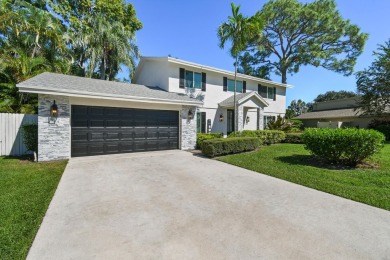 This beautifully updated two-story home is full of charm and on Eastpointe Country Club in Florida - for sale on GolfHomes.com, golf home, golf lot