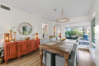 This beautifully updated two-story home is full of charm and on Eastpointe Country Club in Florida - for sale on GolfHomes.com, golf home, golf lot