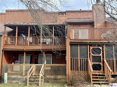 Enjoy resort-style living with beautiful views of the Doe Valley on Doe Valley Country Club in Kentucky - for sale on GolfHomes.com, golf home, golf lot