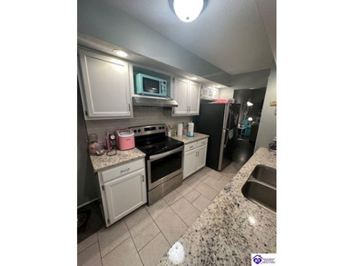 Enjoy resort-style living with beautiful views of the Doe Valley on Doe Valley Country Club in Kentucky - for sale on GolfHomes.com, golf home, golf lot