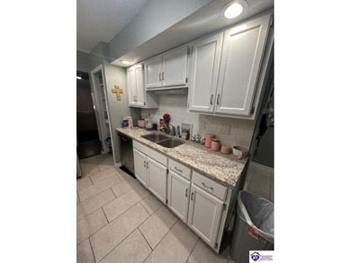 Enjoy resort-style living with beautiful views of the Doe Valley on Doe Valley Country Club in Kentucky - for sale on GolfHomes.com, golf home, golf lot