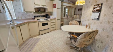 FURNISHED TURN KEY, OPEN BACKYARD Florida 2 bedroom 2 bath home on Zephyrhills Municipal Golf Course in Florida - for sale on GolfHomes.com, golf home, golf lot