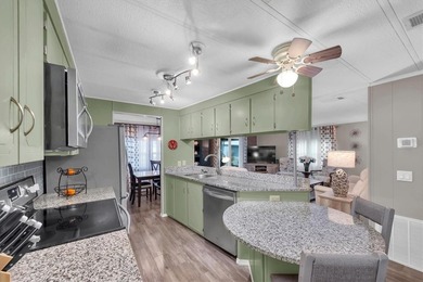 Come see this beautifully updated 2-bedroom, 2-bath manufactured on Largo Golf Course in Florida - for sale on GolfHomes.com, golf home, golf lot