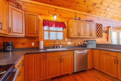 Charming Log Cabin Retreat in Bryson City -Nestled in the heart on Smoky Mountain Country Club in North Carolina - for sale on GolfHomes.com, golf home, golf lot