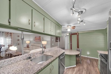 Come see this beautifully updated 2-bedroom, 2-bath manufactured on Largo Golf Course in Florida - for sale on GolfHomes.com, golf home, golf lot