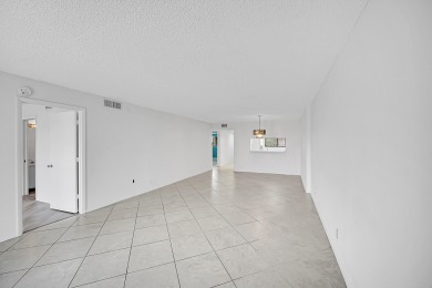 Welcome Home! This exceptional 2-bed, 2-bath condo boasting 1 on Fountains Golf and Country Club in Florida - for sale on GolfHomes.com, golf home, golf lot