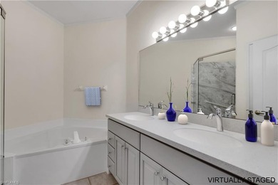 Wake up to sweeping golf course views and warm Southwest Florida on Gulf Harbour Yacht and Country Club in Florida - for sale on GolfHomes.com, golf home, golf lot