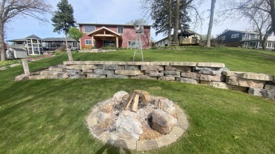 Welcome home to this beautiful, updated, unique charming rustic on Lakes of the Four Seasons Country Club in Indiana - for sale on GolfHomes.com, golf home, golf lot