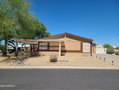 Extraordinarily upgraded 3 bed/2 bath on a large corner cul de on Sun Lakes Country Club in Arizona - for sale on GolfHomes.com, golf home, golf lot