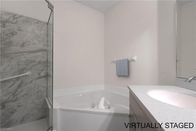 Wake up to sweeping golf course views and warm Southwest Florida on Gulf Harbour Yacht and Country Club in Florida - for sale on GolfHomes.com, golf home, golf lot