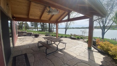 Welcome home to this beautiful, updated, unique charming rustic on Lakes of the Four Seasons Country Club in Indiana - for sale on GolfHomes.com, golf home, golf lot