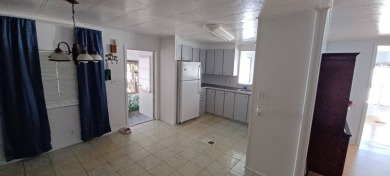 Come settle down in comfort and relaxation in an updated on Fairways Country Club in Florida - for sale on GolfHomes.com, golf home, golf lot
