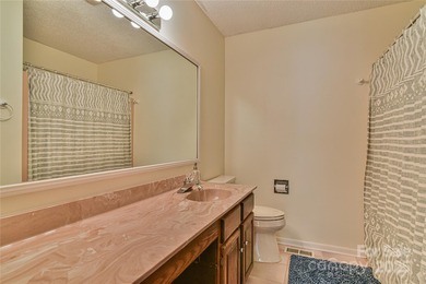 A Sunlit Corner Retreat in The Lynx - Wrapped in Woods, Light on Black Mountain Golf Course in North Carolina - for sale on GolfHomes.com, golf home, golf lot