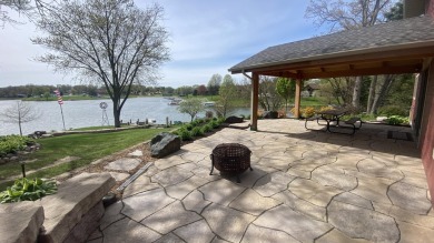 Welcome home to this beautiful, updated, unique charming rustic on Lakes of the Four Seasons Country Club in Indiana - for sale on GolfHomes.com, golf home, golf lot
