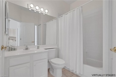 Wake up to sweeping golf course views and warm Southwest Florida on Gulf Harbour Yacht and Country Club in Florida - for sale on GolfHomes.com, golf home, golf lot