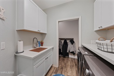 Welcome to this stunning Wingfield Springs residence. This on The Resort At Red Hawk  in Nevada - for sale on GolfHomes.com, golf home, golf lot