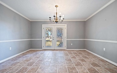 Very well maintained 4/2 home on .84 acre lot with nice view of on Country Club At Lake City in Florida - for sale on GolfHomes.com, golf home, golf lot