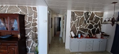 Come settle down in comfort and relaxation in an updated on Fairways Country Club in Florida - for sale on GolfHomes.com, golf home, golf lot