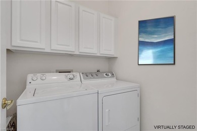 Wake up to sweeping golf course views and warm Southwest Florida on Gulf Harbour Yacht and Country Club in Florida - for sale on GolfHomes.com, golf home, golf lot