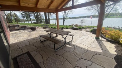 Welcome home to this beautiful, updated, unique charming rustic on Lakes of the Four Seasons Country Club in Indiana - for sale on GolfHomes.com, golf home, golf lot