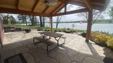 Welcome home to this beautiful, updated, unique charming rustic on Lakes of the Four Seasons Country Club in Indiana - for sale on GolfHomes.com, golf home, golf lot