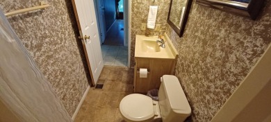 Come settle down in comfort and relaxation in an updated on Fairways Country Club in Florida - for sale on GolfHomes.com, golf home, golf lot