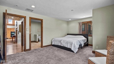 Sip your morning coffee on the covered deck while taking in on Lakota Canyon Ranch and Golf Club in Colorado - for sale on GolfHomes.com, golf home, golf lot