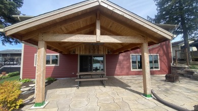 Welcome home to this beautiful, updated, unique charming rustic on Lakes of the Four Seasons Country Club in Indiana - for sale on GolfHomes.com, golf home, golf lot